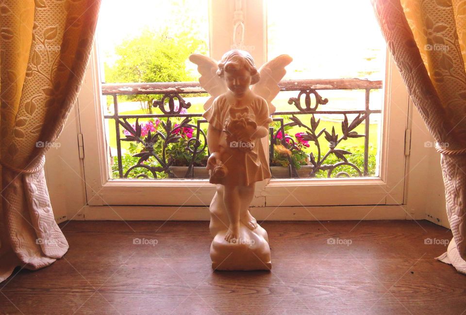 angel in window