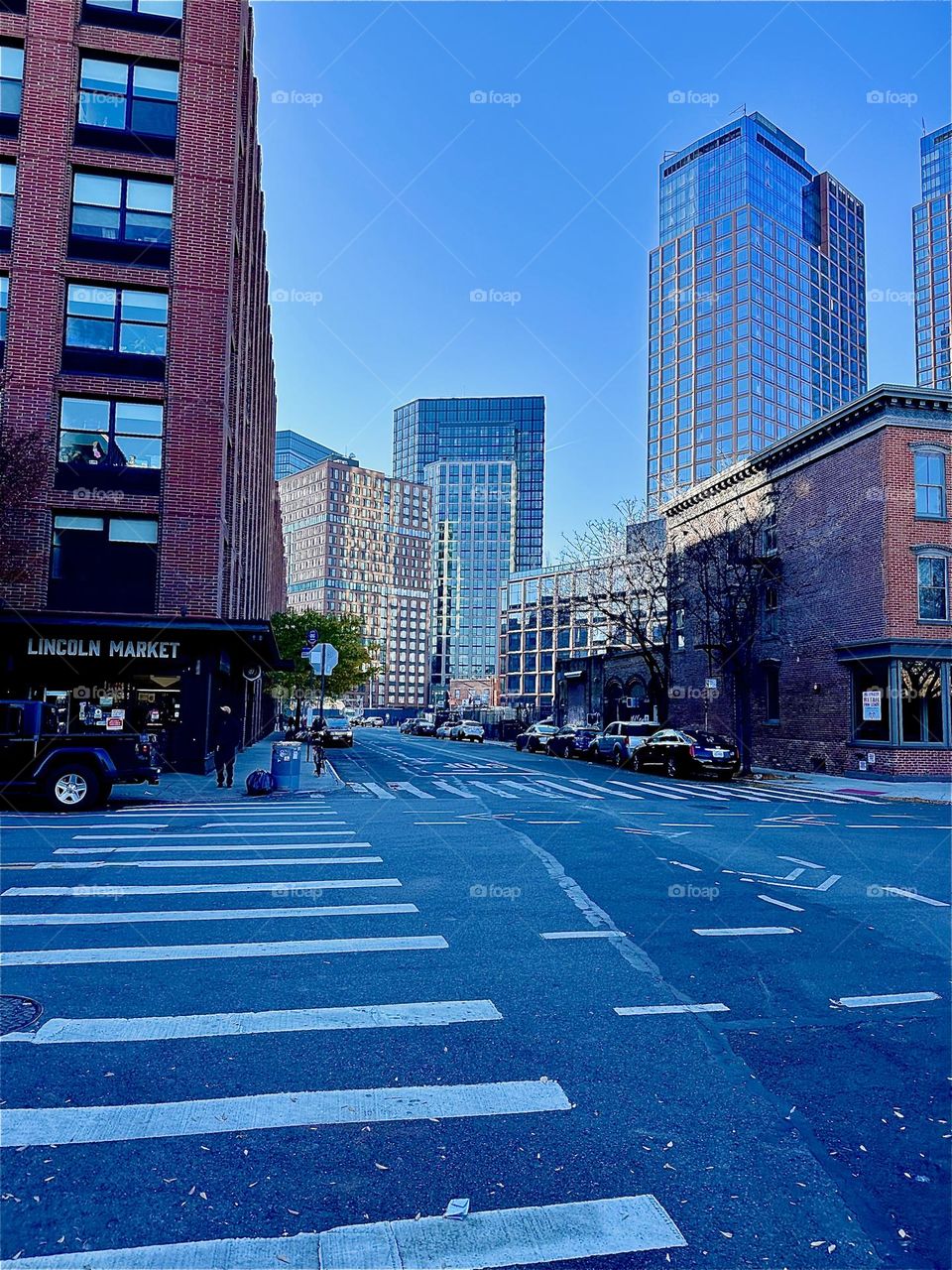 The intersection of “Manhattan Ave” and “Box St” is attractive because of the brownstones and the towers with their solid glass facades. I get off the “B43” bus from “Bushwick”, Bklyn here and walk to the “Pulaski Bridge”. 2023. Hypnotic Productions