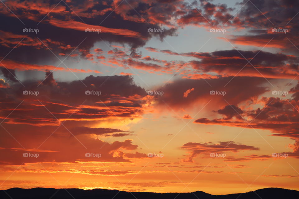 Clouds accumulating on the sky after perfect sunset some stormy pouring scattered showers 