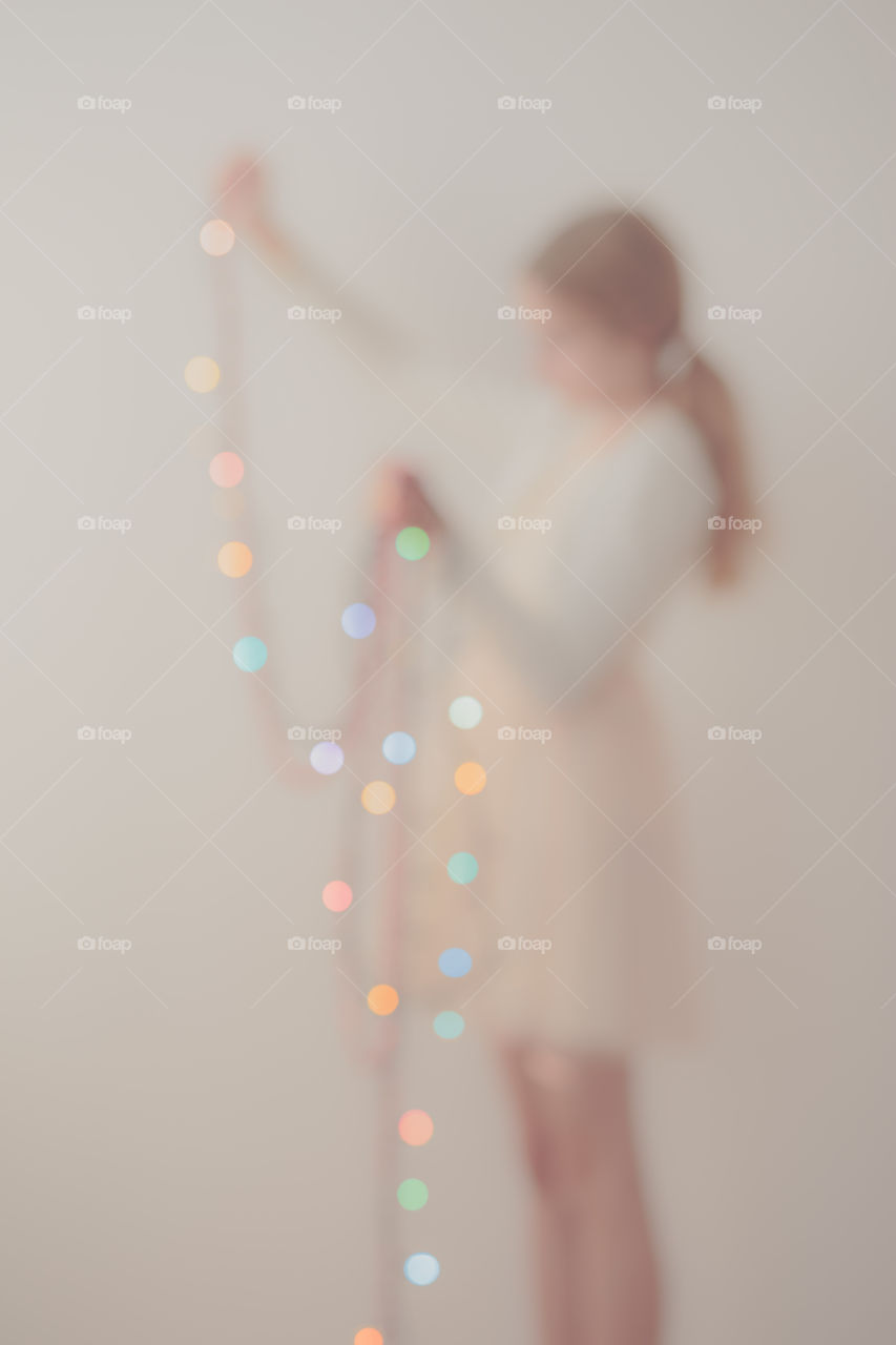 Blurred view of girl with bokeh