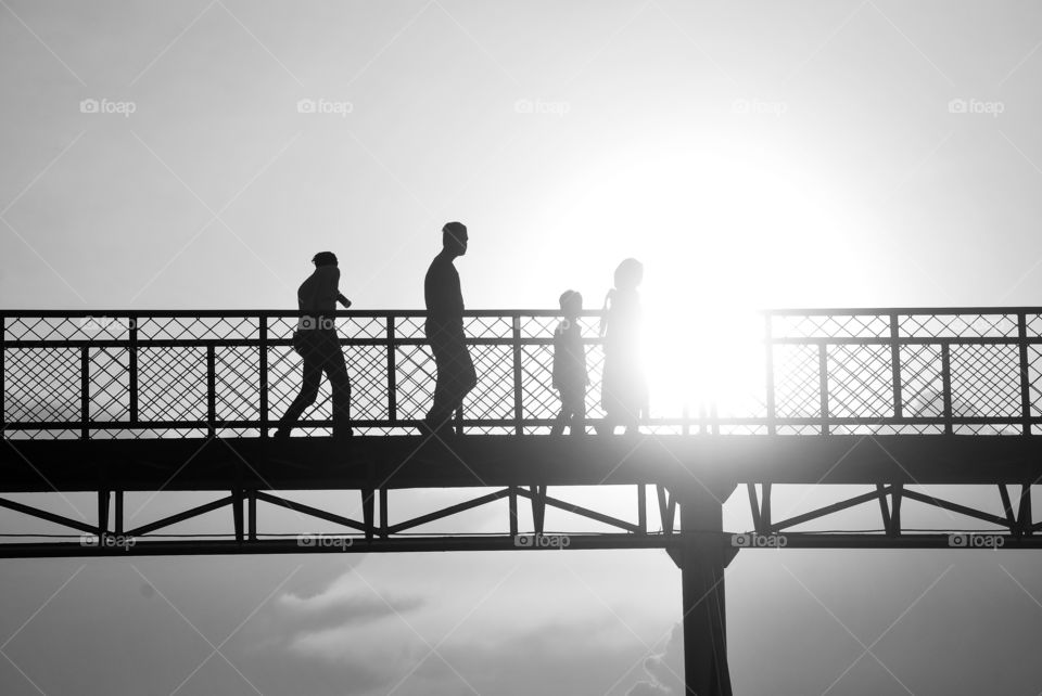 Silhouette On Bridge