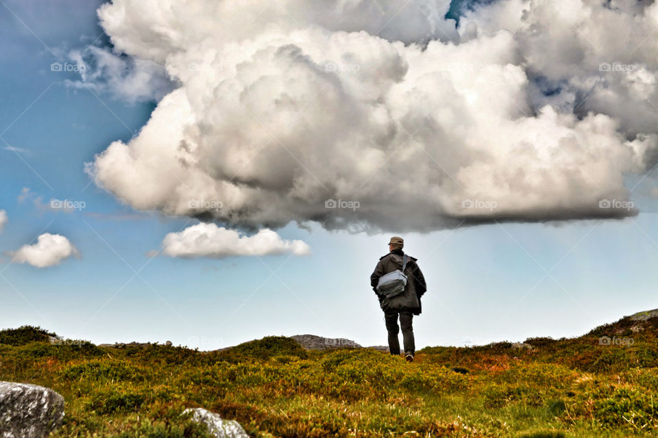 Man under a cloud. 