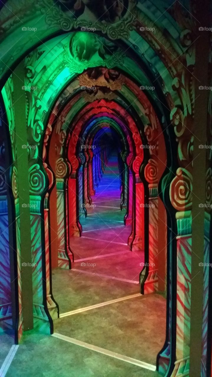 a hall of mirrors. mirror maze