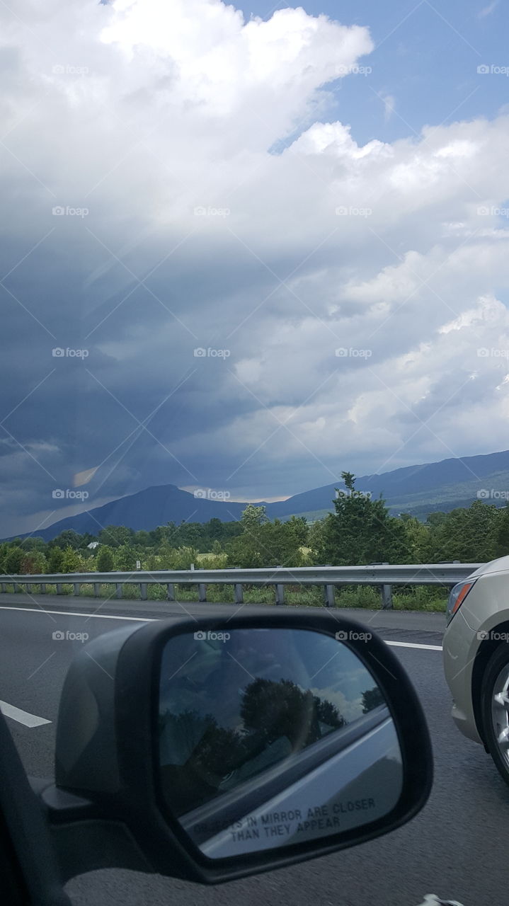 cloudy skies and beautiful mountains