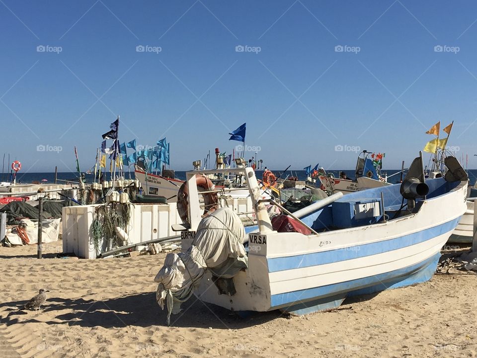 Fishing boats on beach