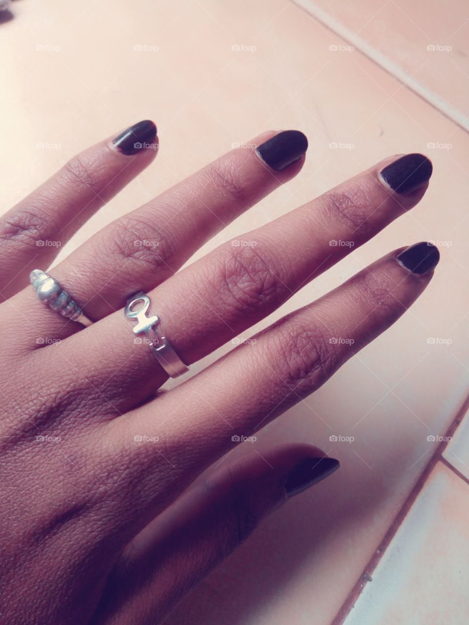 black nails with rings