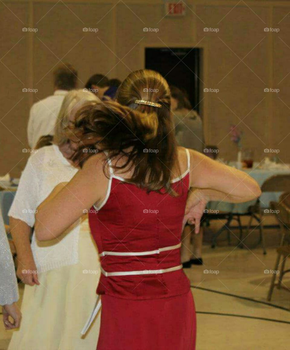 Dancing so hard the hair is swinging.