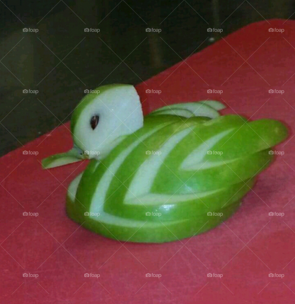 Apple ducky. Cut and made with a granny smith apple.
