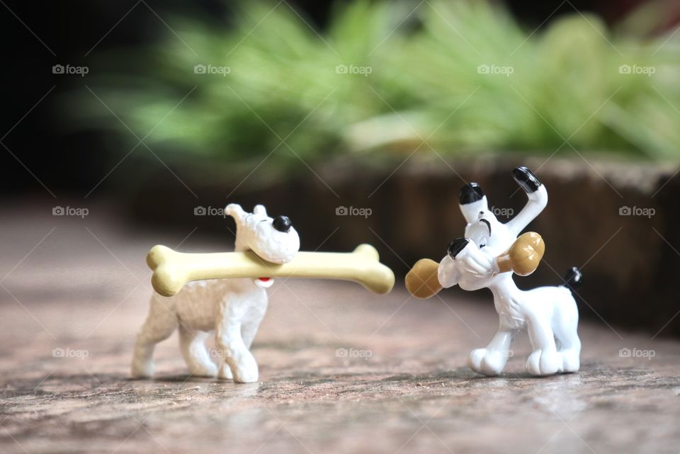 Toy figurines of Snowy and Idefix