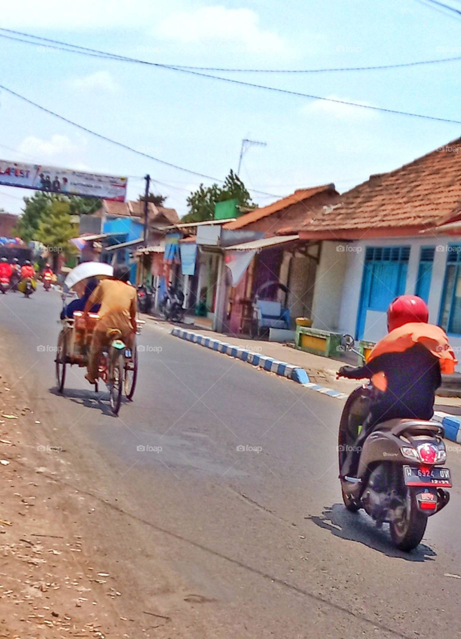 rickshaw and motorcycle