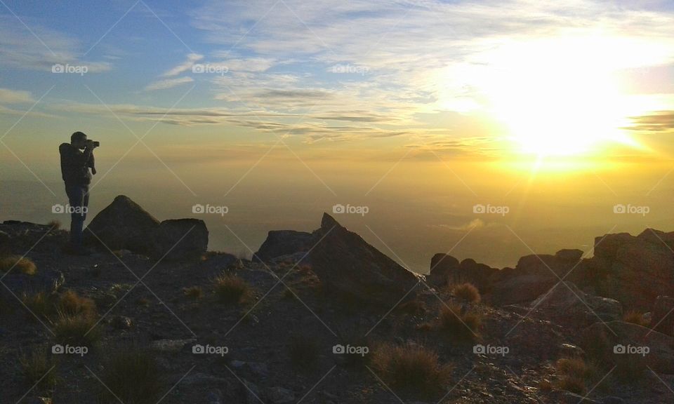 photographing sunset in the mountains