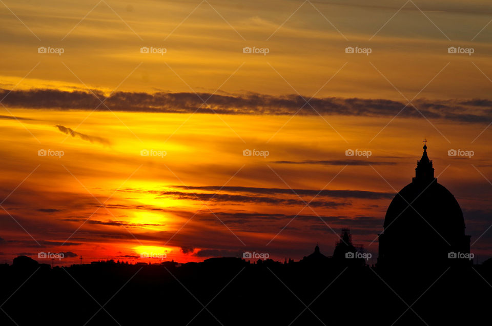 beautiful orange sunset over Rome city