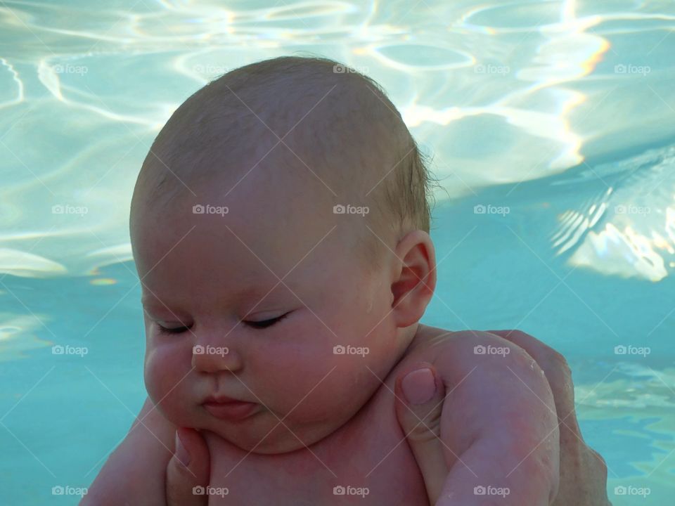 Newborn In The Water

