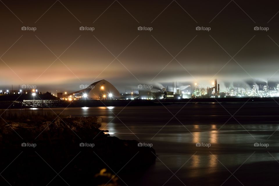 Saint John citylights with fog at night.
