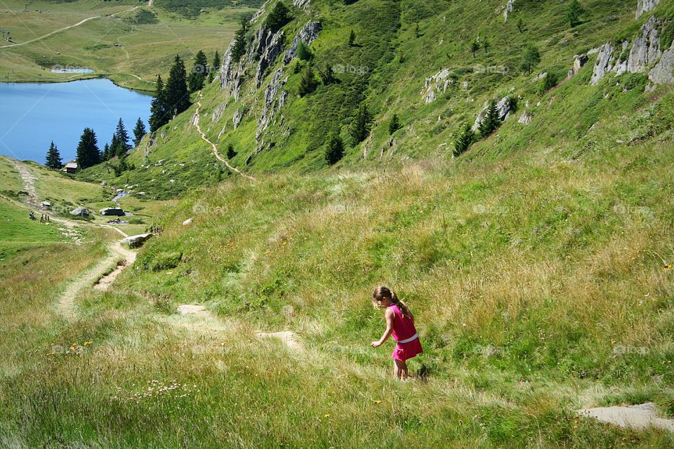 child exploring the Swiss Alps.