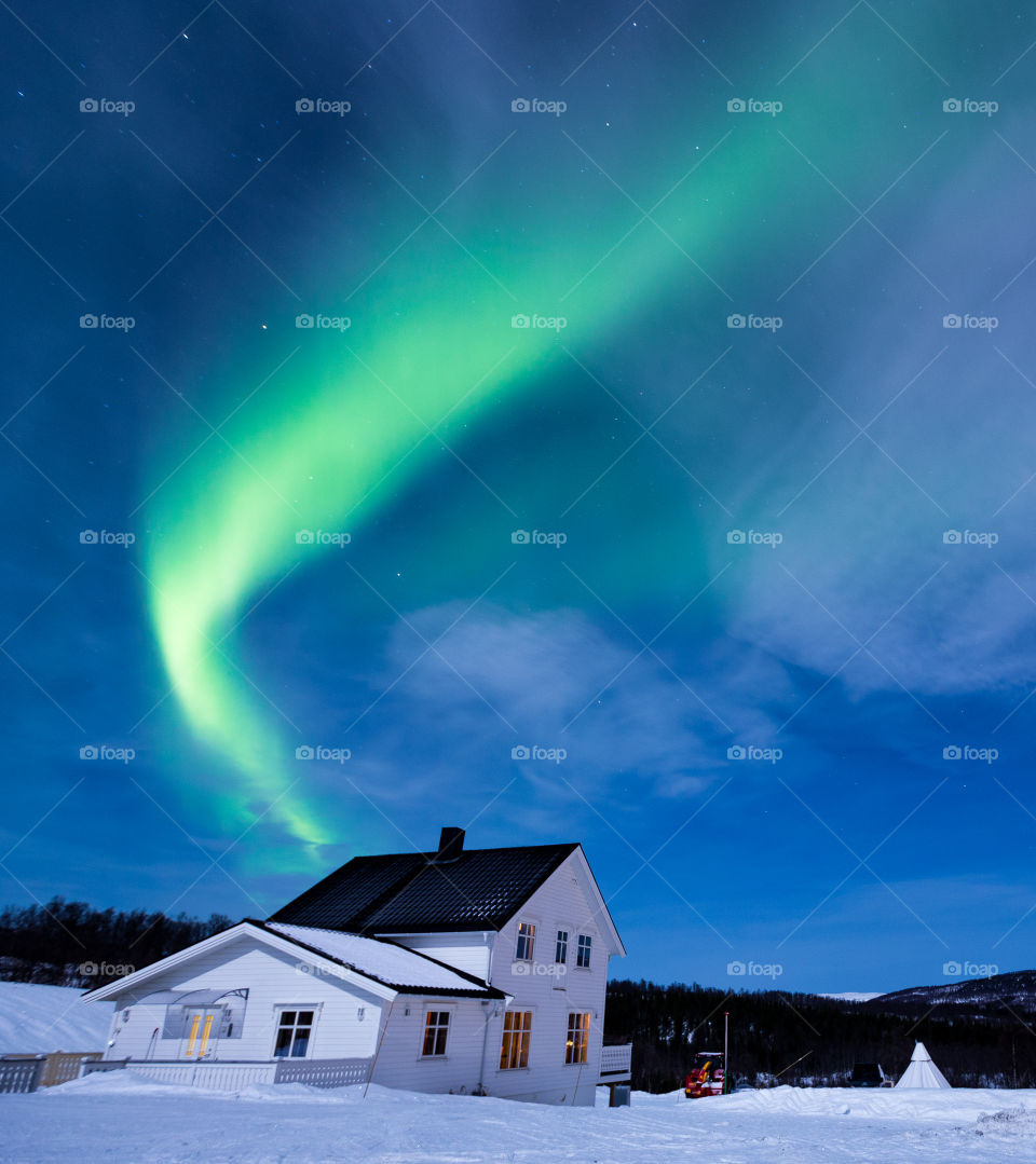 Winter in the northern Norway with aurora borealis