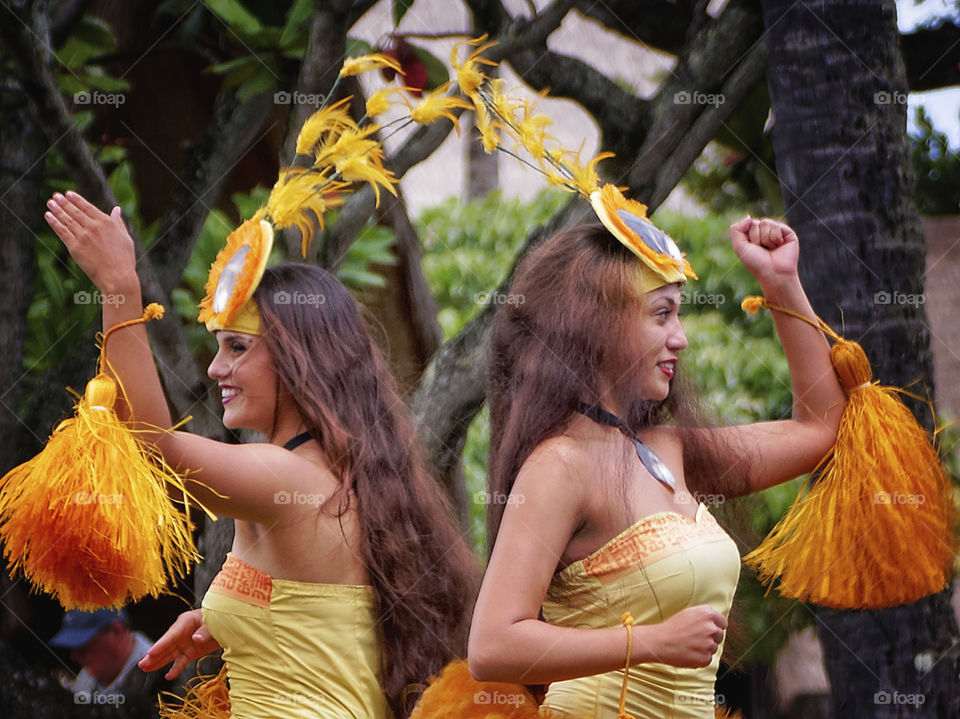 Yellow Pride. Dance display at The  Polynesian Cultural Center on Oahu.