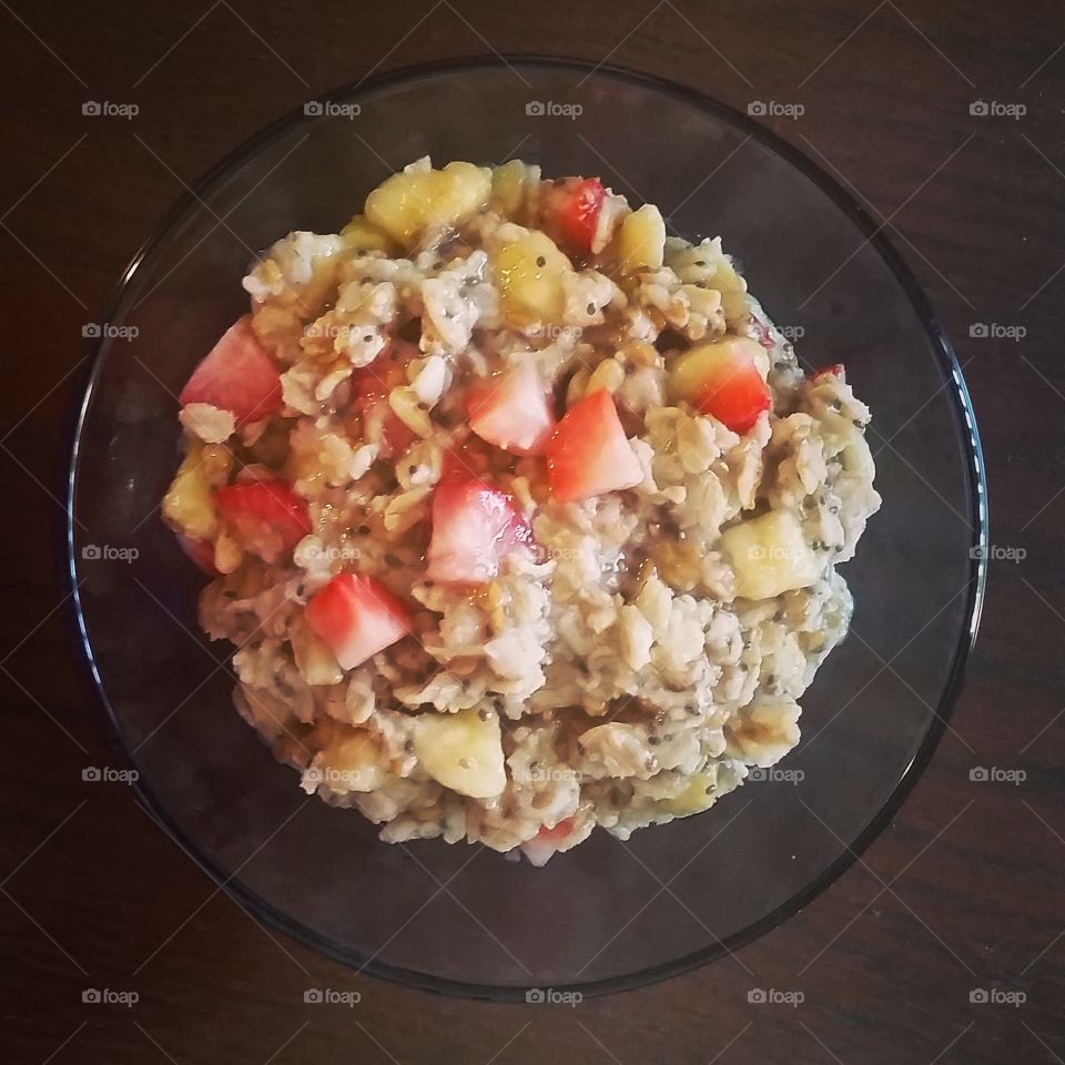 Healthy oat meal for breakfast with fruits