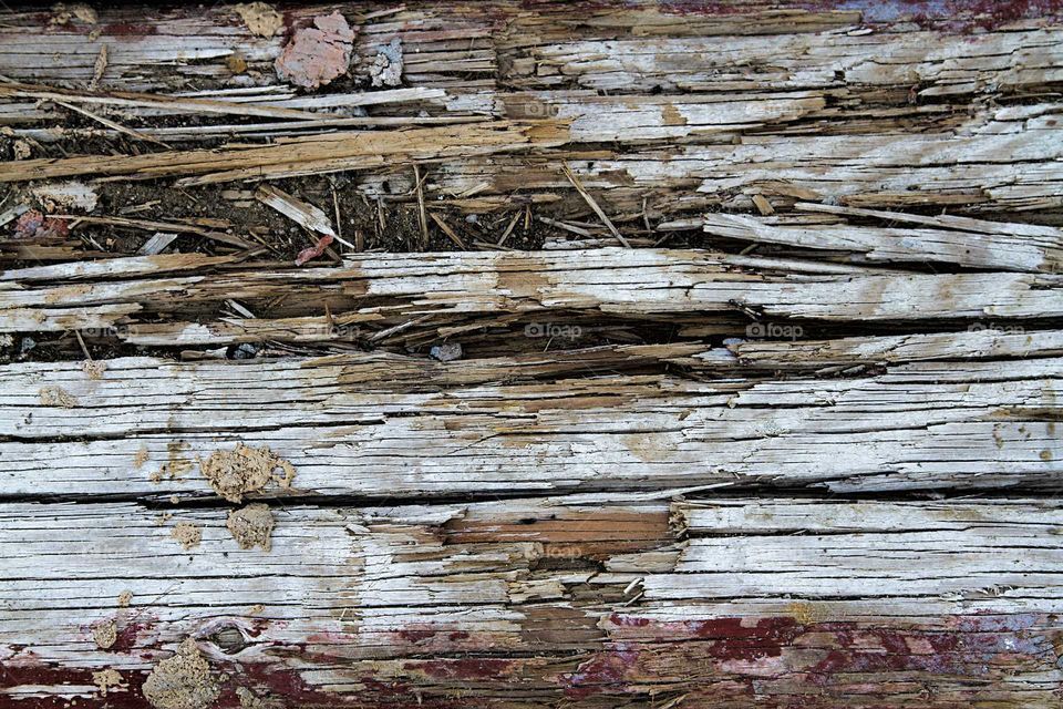 Full frame shot of damaged wooden plank