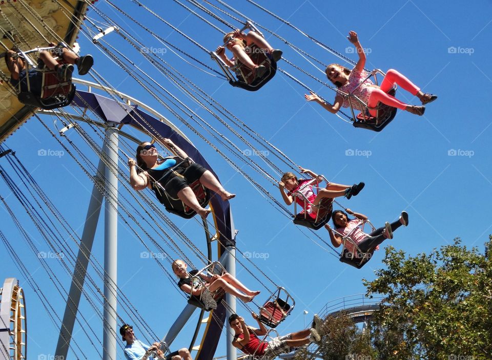 Children On An Amusement Park Ride