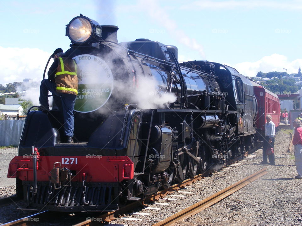 An old steam train is stationary in Napier NZ. It is Art Deco weekend. We celebrate this every year. All aboard!!!!
