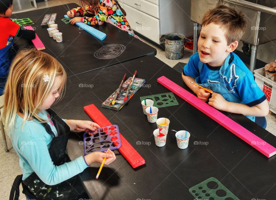 School Art Desk. Children Doing Art At A Classroom Desk
