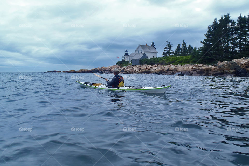 paddling by Mark Island Lighthouse in Frenchman Bay Maine