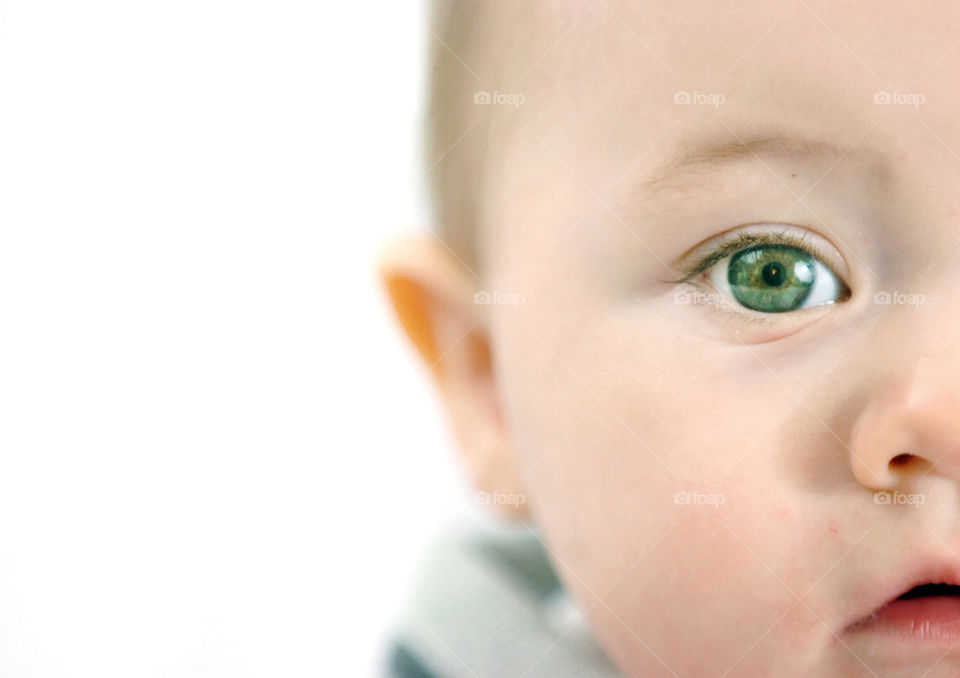 CLOSE UP OF THE RIGHT HAND SIDE OF THE FACE OF A ONE YEAR OLD WHITE