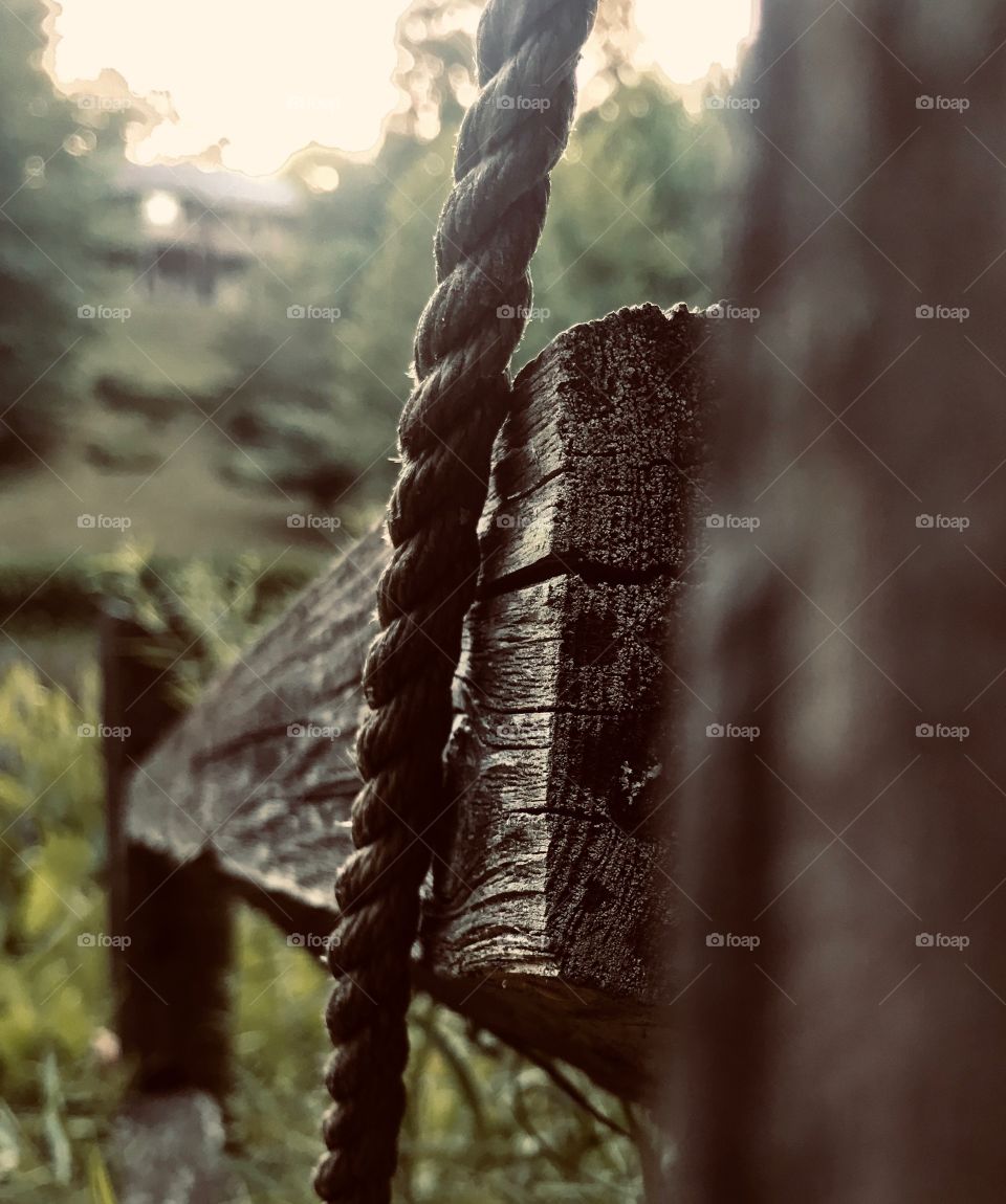Wood fence with rope
