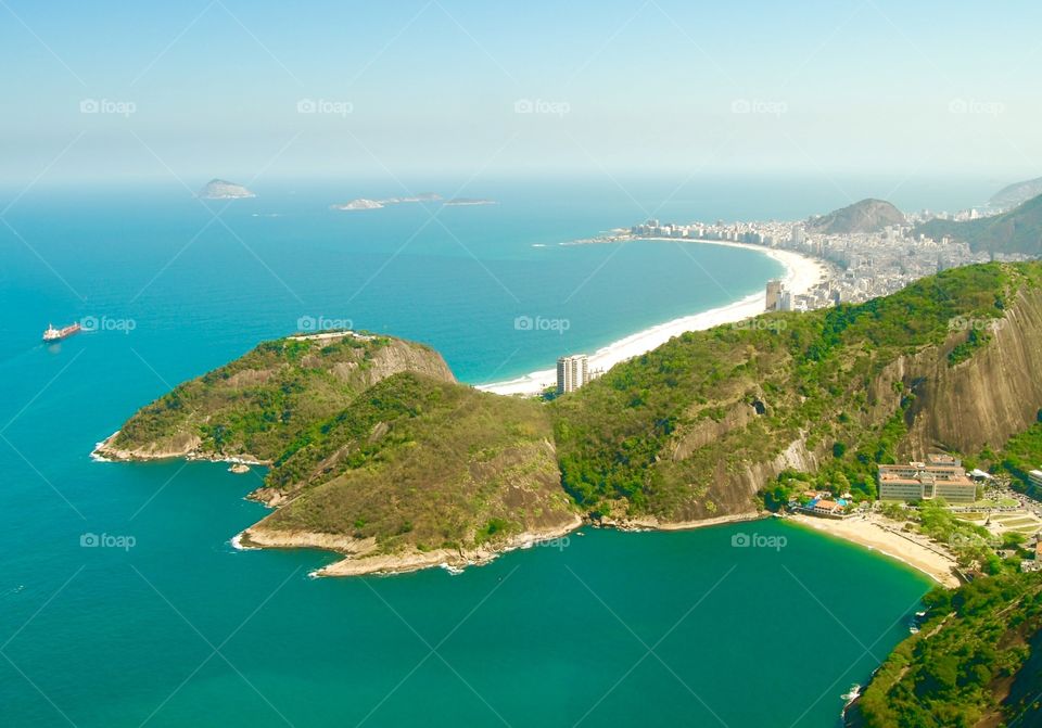 the beaches of brazil. a view of the famed copacabana beach and the unknown velmena beach at the foot of the sugarloaf mountain. beaches!