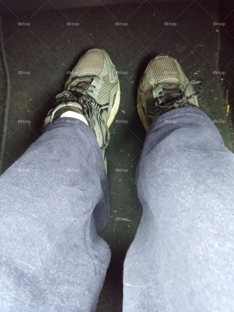 My Feet. On the floor board of the car