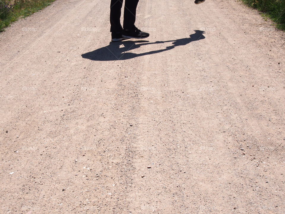 shadow of father and son playing