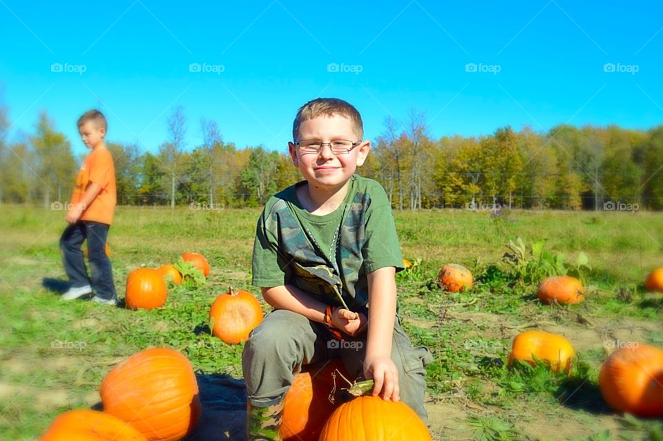Just a boy and his pumpkin 
