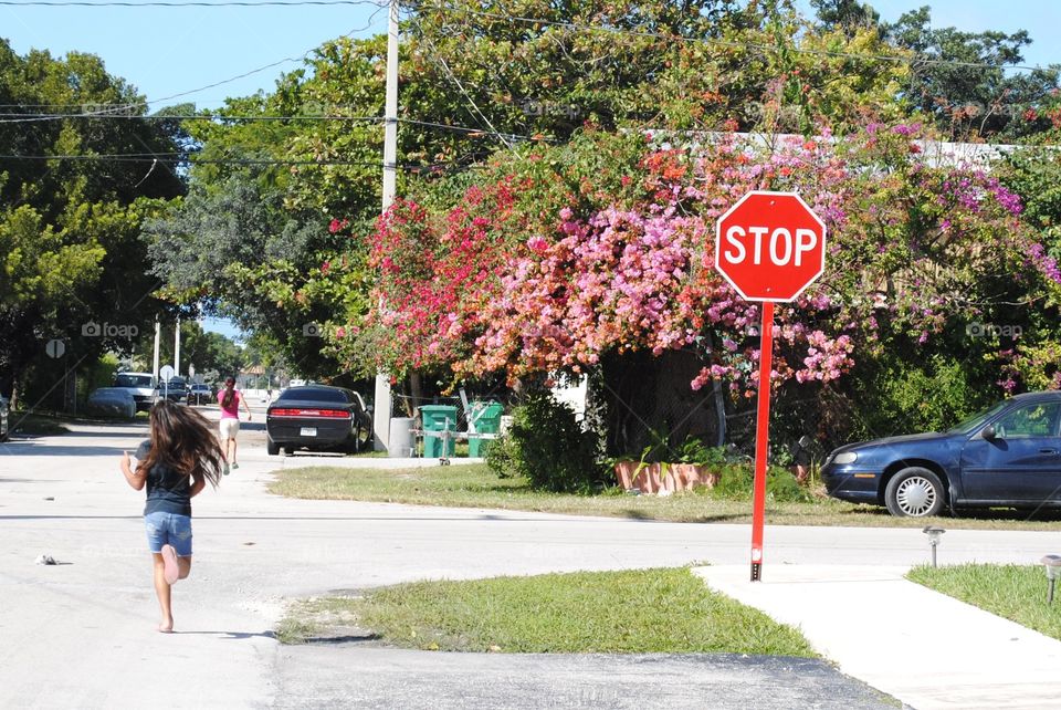 Kids running outside in Key West, Fl