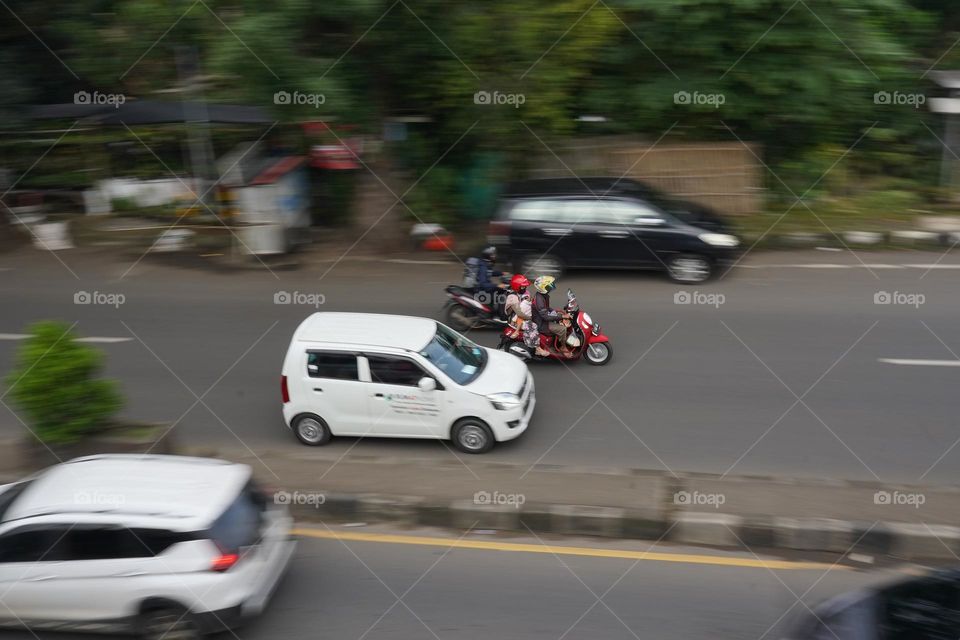 One family on the red motorcycle 