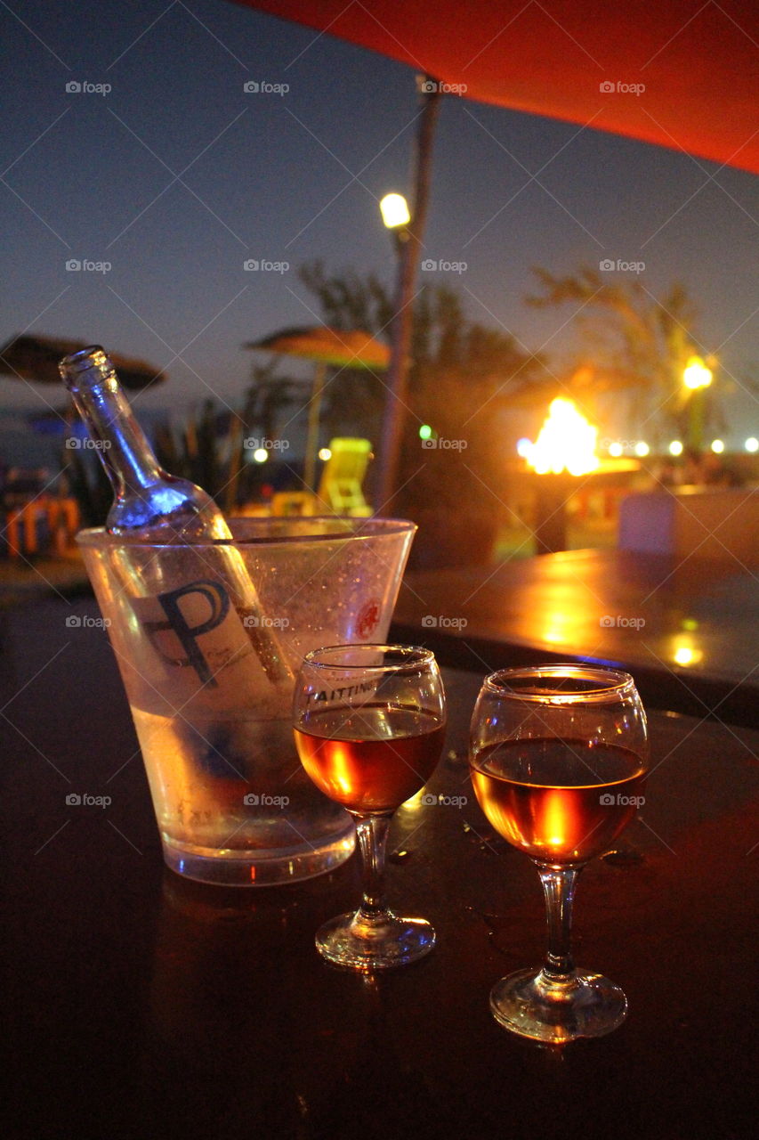 Wine by the fire. Enjoying a glass of wine by the fire pit in Essaouira, Morocco.