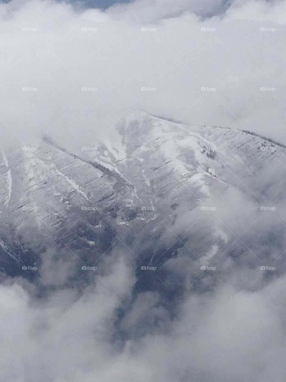 Snow caps. Snow on Utah mountains from above