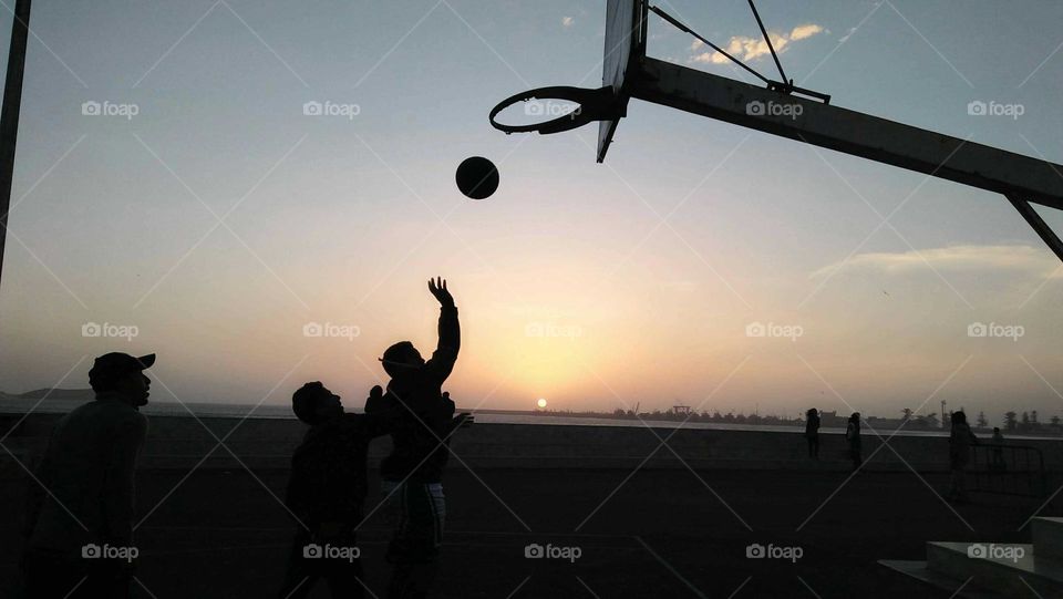 Basketball goal and a team.