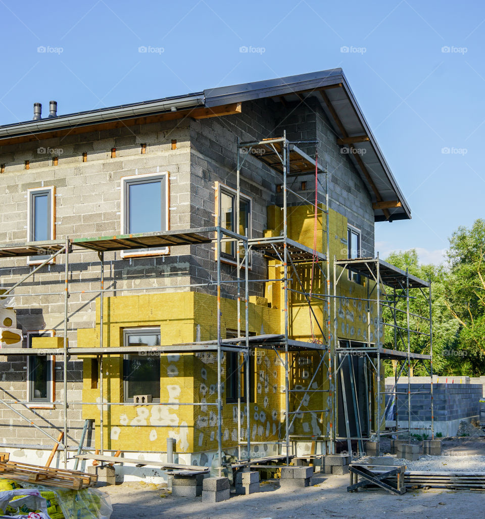 concrete foundation of a new house, view of construction site in preparation proccess