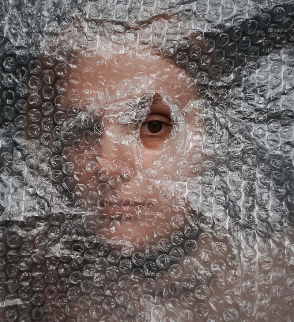Portrait of a girl with a protective film