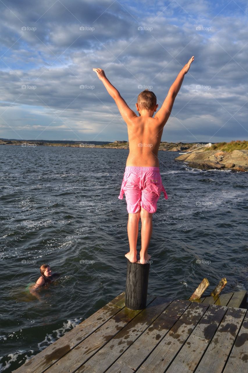 Boy diving in the sea