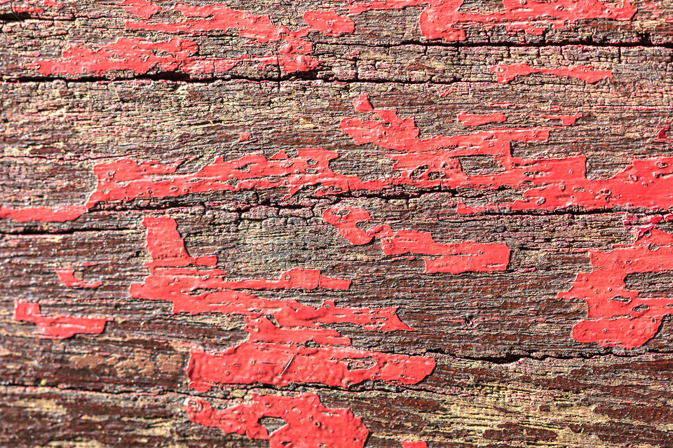Red paint on plank