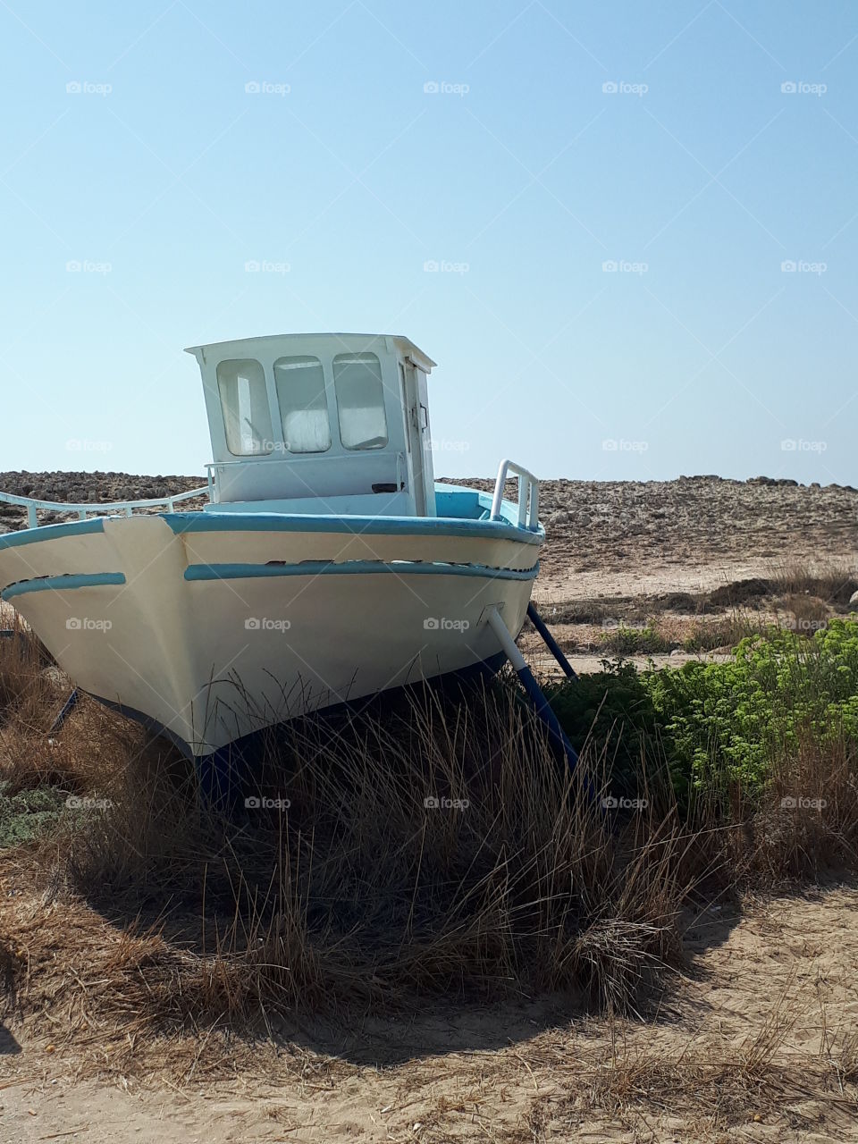 boat sand sky