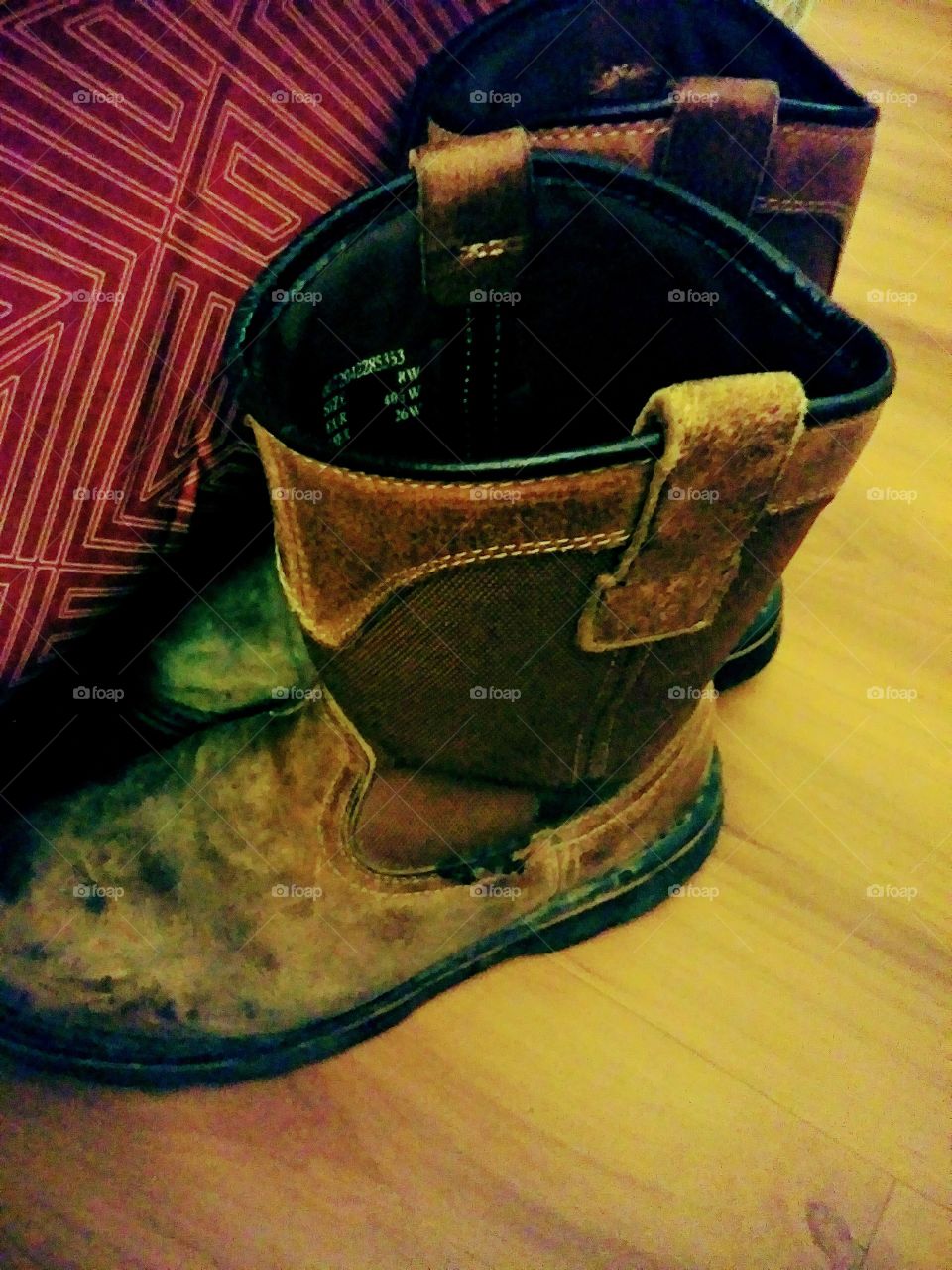 Rugged, worn, work boots......