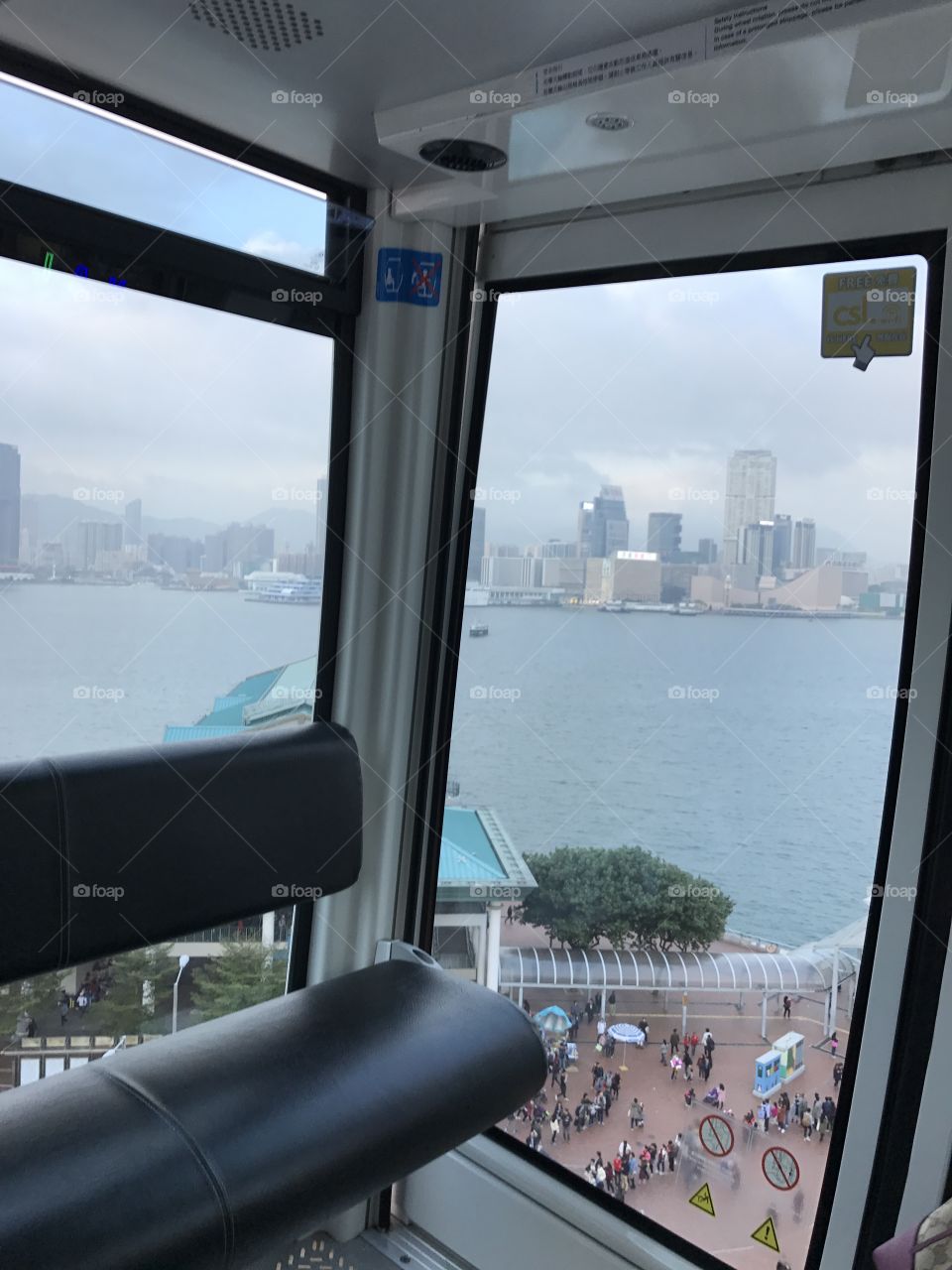 Ferries wheel in Hong Kong, clear sky, nice view, sea 
