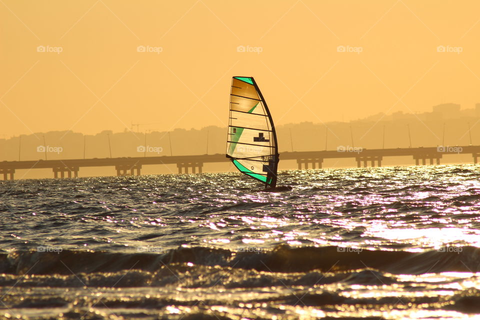 Water sports windsurf sunset beauty and color 