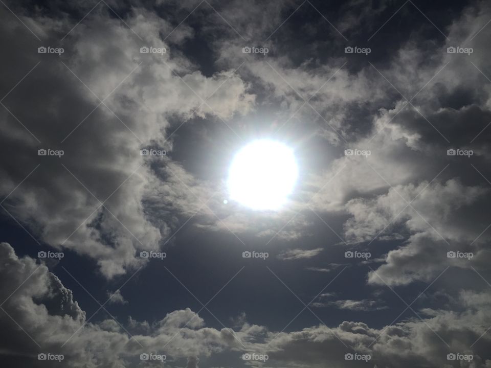 Cloudy sun