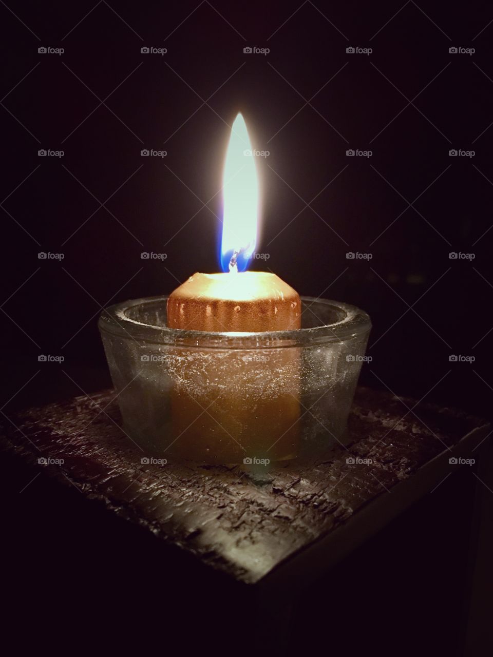 One lit candle 