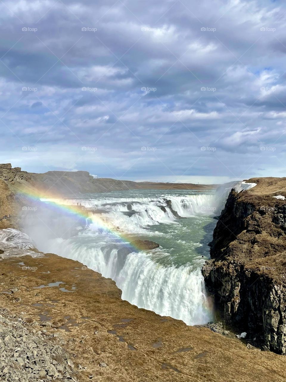 Iceland rainbow waterfall view