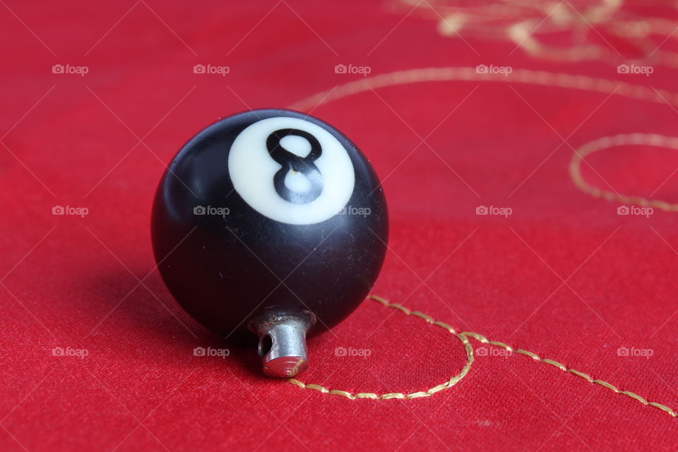 8 ball on red background